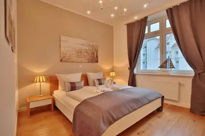 Ein Bett oder Betten in einem Zimmer der Unterkunft Villa Strandallee 164 Villa Strandallee 164 Appartement 3