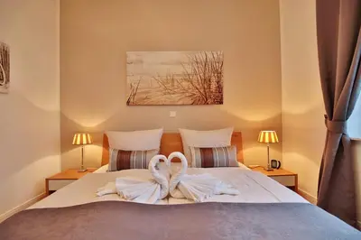 Ein Bett oder Betten in einem Zimmer der Unterkunft Villa Strandallee 164 Villa Strandallee 164 Appartement 3