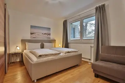 Ein Bett oder Betten in einem Zimmer der Unterkunft Domizil am Meer Domizil am Meer Appartement 13