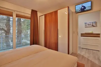 Ein Bett oder Betten in einem Zimmer der Unterkunft Domizil am Meer Domizil am Meer Appartement 14