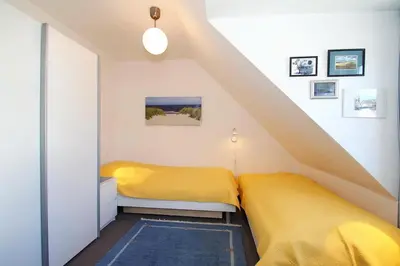 Ein Bett oder Betten in einem Zimmer der Unterkunft Gorch-Fock-Park Haus 06 Gorch-Fock-Park 6 Appartement 7