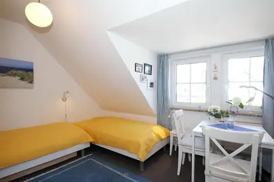 Ein Bett oder Betten in einem Zimmer der Unterkunft Gorch-Fock-Park Haus 06 Gorch-Fock-Park 6 Appartement 7