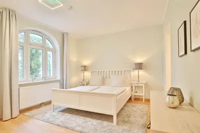 Ein Bett oder Betten in einem Zimmer der Unterkunft Villa Strandallee 164 Villa Strandallee 164 Appartement 5