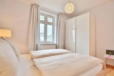 Ein Bett oder Betten in einem Zimmer der Unterkunft Villa Strandallee 164 Villa Strandallee 164 Appartement 5