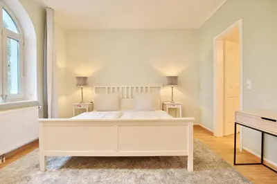 Ein Bett oder Betten in einem Zimmer der Unterkunft Villa Strandallee 164 Villa Strandallee 164 Appartement 5
