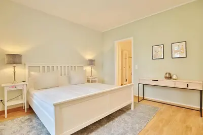 Ein Bett oder Betten in einem Zimmer der Unterkunft Villa Strandallee 164 Villa Strandallee 164 Appartement 5