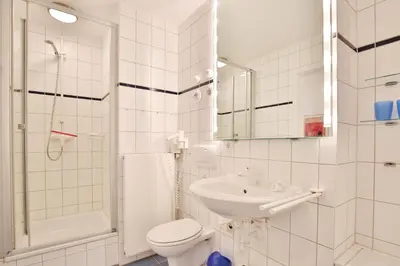 Ein Badezimmer in der Unterkunft Feriendomizil Birkenallee Feriendomizil Birkenallee Appartement 05