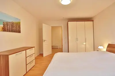 Ein Bett oder Betten in einem Zimmer der Unterkunft Villa Mér Baltique Villa Mér Baltique Appartement 20