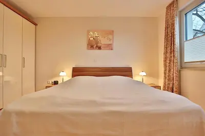 Ein Bett oder Betten in einem Zimmer der Unterkunft Villa Mér Baltique Villa Mér Baltique Appartement 20