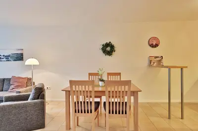 Ein Sitzbereich in der Unterkunft Villa Mér Baltique Villa Mér Baltique Appartement 20