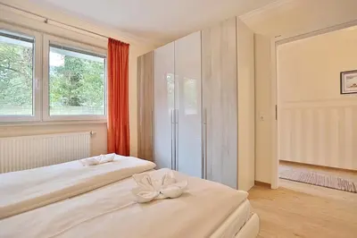 Ein Bett oder Betten in einem Zimmer der Unterkunft Domizil am Meer Domizil am Meer Appartement 07