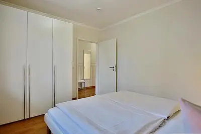 Ein Bett oder Betten in einem Zimmer der Unterkunft Domizil am Meer Domizil am Meer Appartement 12