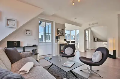 Ein Sitzbereich in der Unterkunft Bädervilla Bergstraße 30 Bädervilla Bergstraße Appartement 9