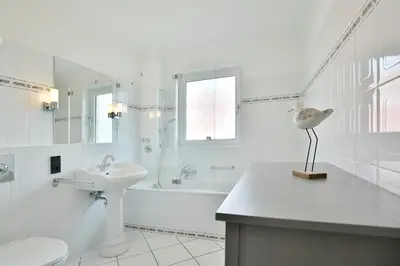 Ein Badezimmer in der Unterkunft Am Elchgrund Eastcoast-Appartement 4