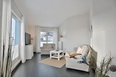 Ein Sitzbereich in der Unterkunft Penthouse am Platz Penthouse am Platz Appartement 10