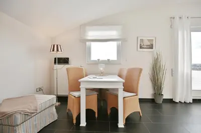 Ein Sitzbereich in der Unterkunft Penthouse am Platz Penthouse am Platz Appartement 10