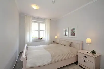 Ein Bett oder Betten in einem Zimmer der Unterkunft Domizil Gartenstraße Domizil Gartenstraße 4 Appartement 2