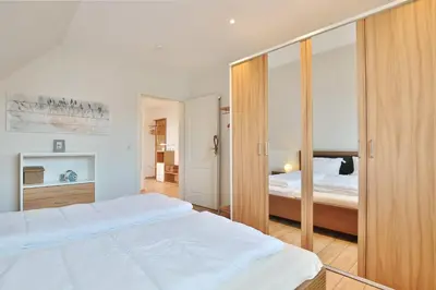 Ein Bett oder Betten in einem Zimmer der Unterkunft Baltic Lodge Baltic Lodge Appartement 6