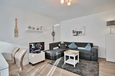 Ein Sitzbereich in der Unterkunft Domizil Strandallee 30 Domizil Strandallee 30 Appartement 01