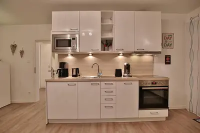 Küche/Küchenzeile in der Unterkunft Domizil Strandallee 30 Domizil Strandallee 30 Appartement 01