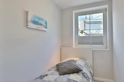 Ein Bett oder Betten in einem Zimmer der Unterkunft Haus Meeresrauschen Haus Meeresrauschen Appartement 9