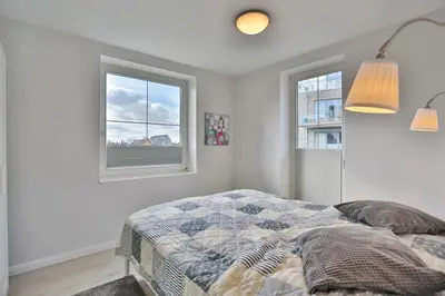 Ein Bett oder Betten in einem Zimmer der Unterkunft Haus Meeresrauschen Haus Meeresrauschen Appartement 9