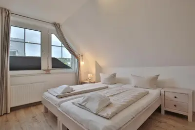 Ein Bett oder Betten in einem Zimmer der Unterkunft Strandhus Strandhus