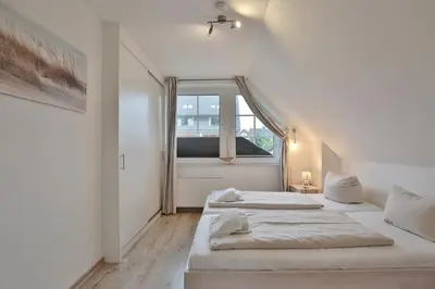 Ein Bett oder Betten in einem Zimmer der Unterkunft Strandhus Strandhus