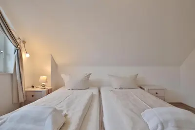 Ein Bett oder Betten in einem Zimmer der Unterkunft Strandhus Strandhus