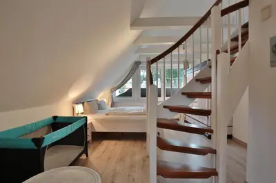 Ein Bett oder Betten in einem Zimmer der Unterkunft Strandhus Strandhus