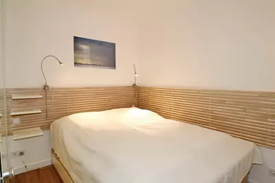 Ein Bett oder Betten in einem Zimmer der Unterkunft Strandresidenz Timmendorfer Strand Strandresidenz Appartement 101