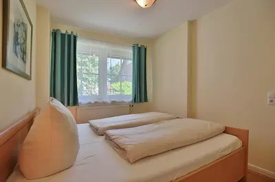 Ein Bett oder Betten in einem Zimmer der Unterkunft Gorch-Fock-Park Haus 57 Gorch-Fock-Park 57 Appartement 17 Strandvergnügen