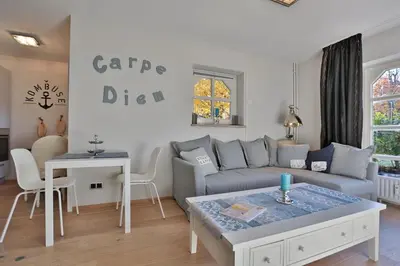Ein Sitzbereich in der Unterkunft Am Rosenhain 12 Am Rosenhain 12 Appartement 1