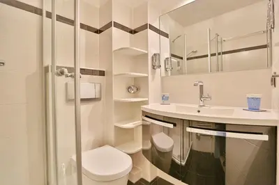 Ein Badezimmer in der Unterkunft Am Rosenhain 12 Am Rosenhain 12 Appartement 1