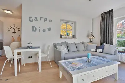 Ein Sitzbereich in der Unterkunft Am Rosenhain 12 Am Rosenhain 12 Appartement 1