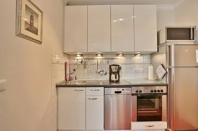 Küche/Küchenzeile in der Unterkunft Haus am Höppnerweg 5 Haus am Höppnerweg 5 Appartement 05