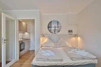 Ein Bett oder Betten in einem Zimmer der Unterkunft Villa Idyll Strandstudio Appartement 12 in der Villa Idyll