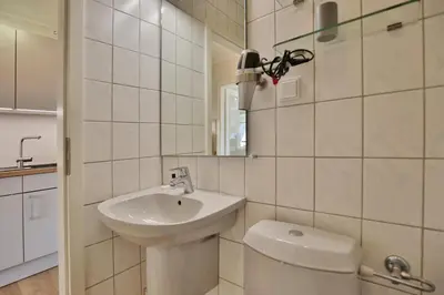 Ein Badezimmer in der Unterkunft Villa Idyll Strandstudio Appartement 12 in der Villa Idyll