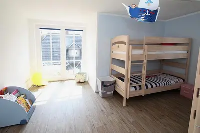 Ein Bett oder Betten in einem Zimmer der Unterkunft Residenz Poststraße 12 Residenz Poststraße 12 Appartement 1