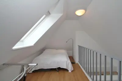 Ein Bett oder Betten in einem Zimmer der Unterkunft Am Rosenhain 19 Am Rosenhain 19 Appartement 4