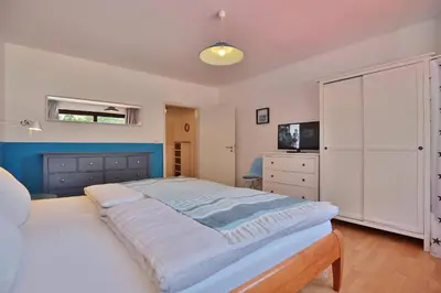 Ein Bett oder Betten in einem Zimmer der Unterkunft Haus Kastanienallee Strandkoje