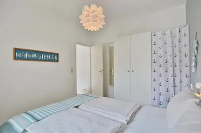 Ein Bett oder Betten in einem Zimmer der Unterkunft Haus Strandallee 188 Schmuckkästchen