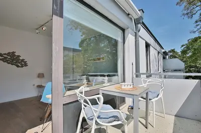 Ein Balkon oder eine Terrasse in der Unterkunft Haus Strandallee 188 Schmuckkästchen