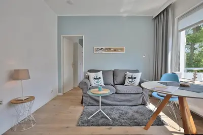 Ein Sitzbereich in der Unterkunft Haus Strandallee 188 Schmuckkästchen