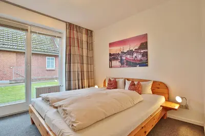 Ein Bett oder Betten in einem Zimmer der Unterkunft Am Rosenhain 8 Am Rosenhain 8 Appartement 2