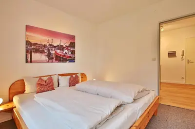 Ein Bett oder Betten in einem Zimmer der Unterkunft Am Rosenhain 8 Am Rosenhain 8 Appartement 2