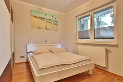 Ein Bett oder Betten in einem Zimmer der Unterkunft Domizil am Meer Domizil am Meer Appartement 20
