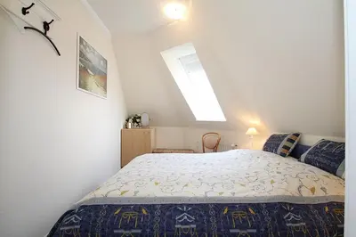 Ein Bett oder Betten in einem Zimmer der Unterkunft Am Rosenhain 8 Am Rosenhain 8 Appartement 4