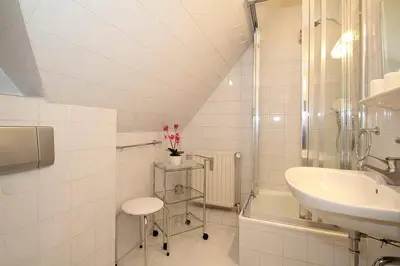 Ein Badezimmer in der Unterkunft Am Rosenhain 8 Am Rosenhain 8 Appartement 4