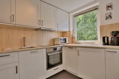 Küche/Küchenzeile in der Unterkunft Haus Kastanienallee 3 Haus Kastanienallee 3 Appartement 8